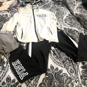 Size Small Pink leggings with matching size medium zip up jacket.